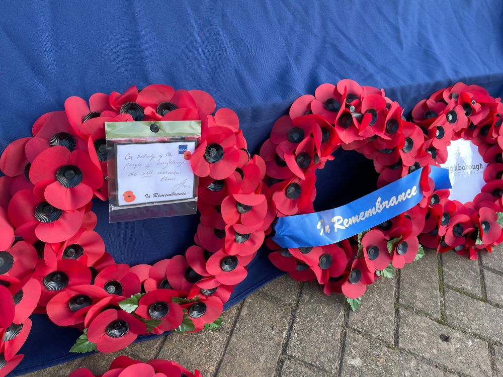 Two of the wreaths laid by community members