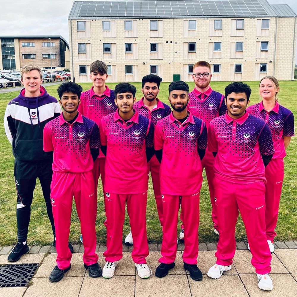 Loughborough College cricket team standing in uniform