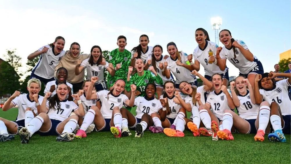 The Young Lionesses U17 women's squad celebrate together